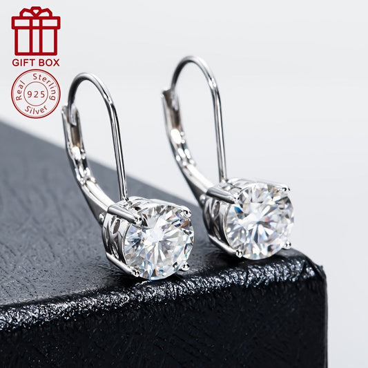 Luxurious and elegant, these gorgeous earrings are made of 925 sterling silver and feature a dazzling moissanite gemstone. Hypoallergenic and lightweight at approximately 2.1g, they are the perfect gift for a stylish girlfriend who loves to sparkle at