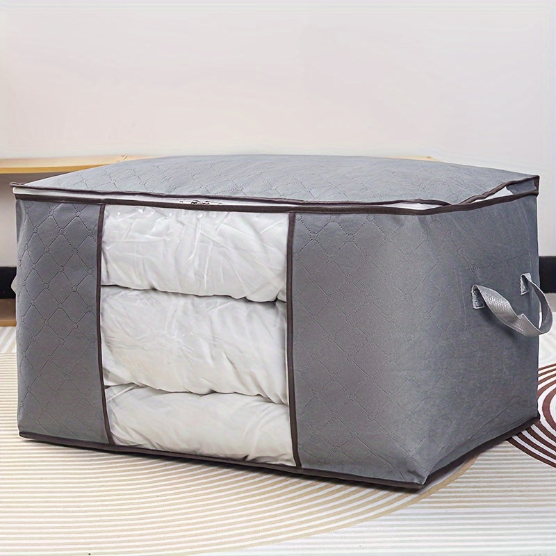 Big fabric bag with clear window for storing clothes and blankets.