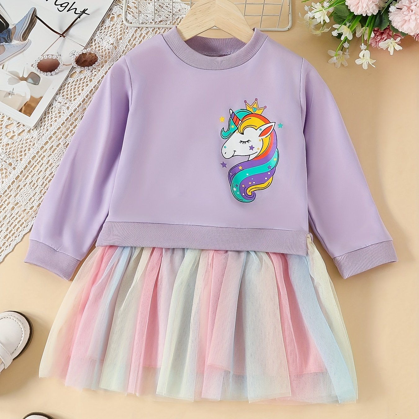 Rainbow tutu dress with unicorn print for girls, perfect for parties or vacations in spring or autumn.