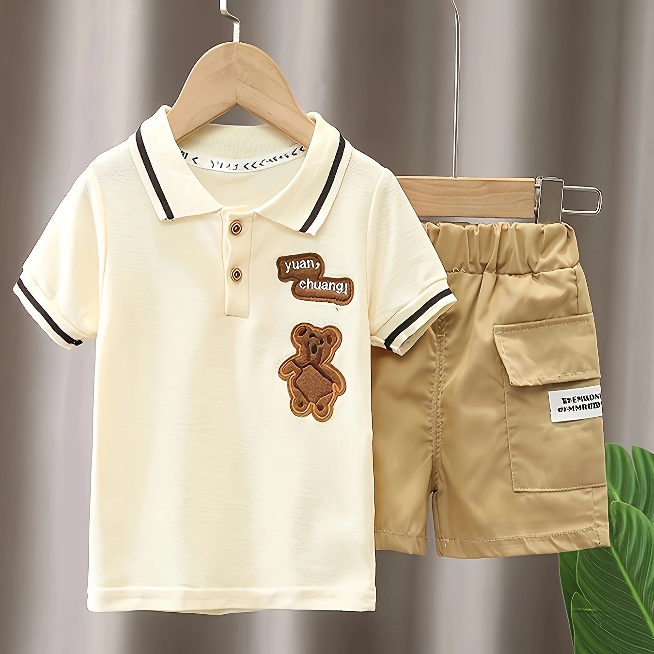 Kids summer clothes set featuring cute cartoon t-shirt and shorts for toddler boys and girls. Ideal for outdoor activities.