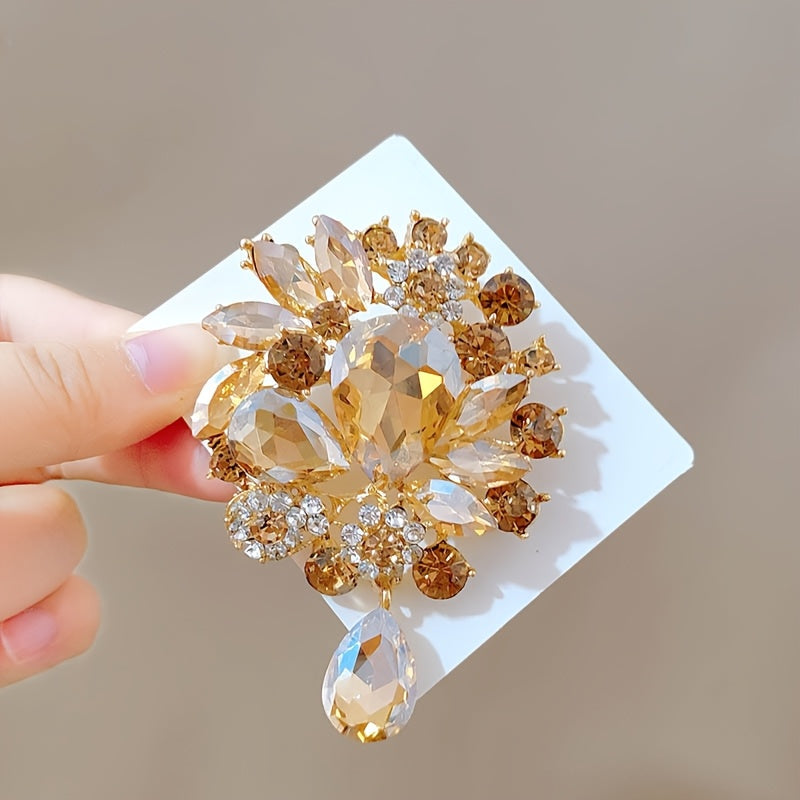 Vintage crystal brooch pin with irregular teardrop pendant and novelty glass flower design - an elegant and high-end fashion accessory for women.