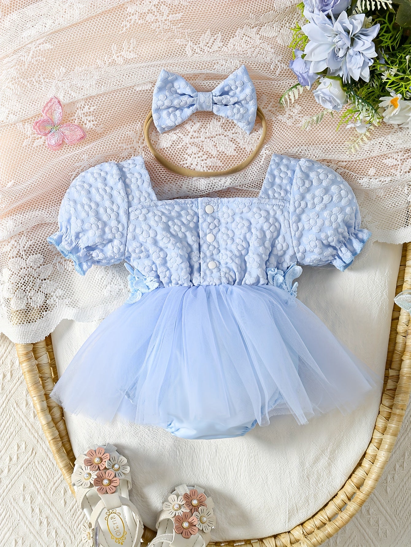 Girls' elegant floral embroidered tutu dress with puff sleeves and applique detail. 100% polyester woven fabric, perfect for outdoor wear.