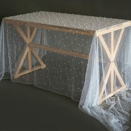 Wedding veil lace table runner with beaded pearls and soft tulle for table decor at weddings, parties, and holidays.