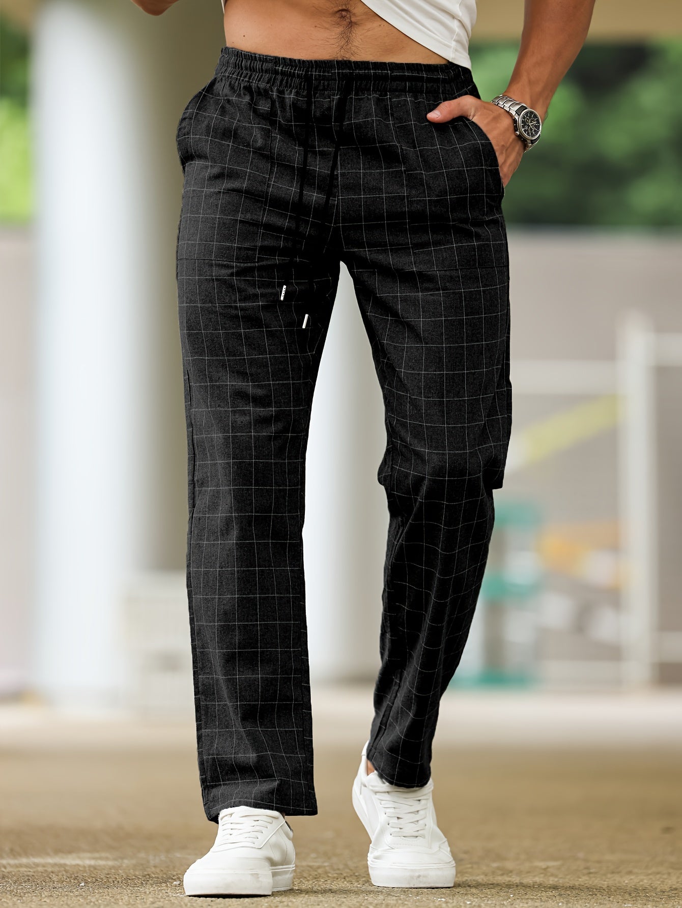 Men's polyester pants with drawstring waist, ideal for spring and fall, featuring casual striped plaid pattern.