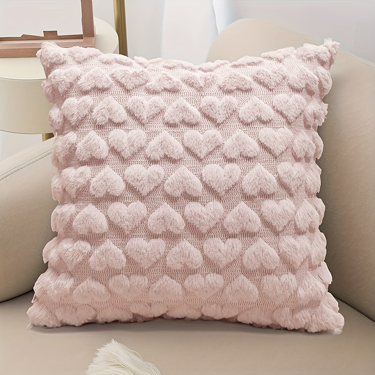 One set of cute beige decorative throw pillow covers, 18x18, made of soft plush faux fur wool for couch or sofa décor.