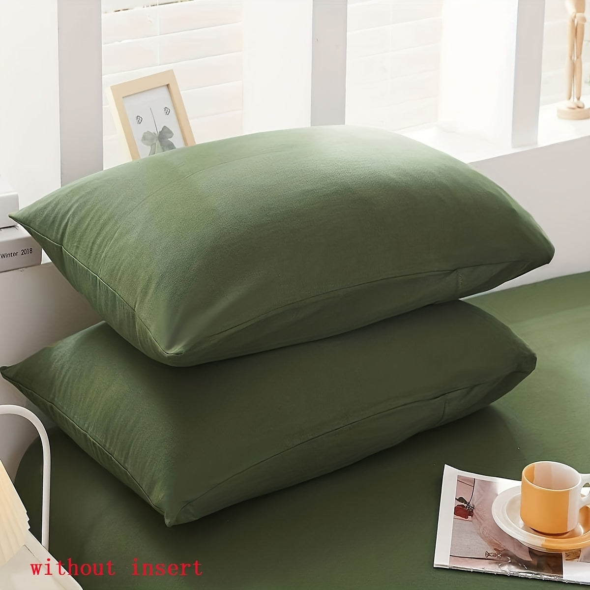 Two luxurious Army Green pillowcases made of soft brushed polyester, featuring a 100% weave. These pillowcases are machine washable and have a zipper closure for easy use. They are both elegant and durable, making them perfect bedroom accessories for