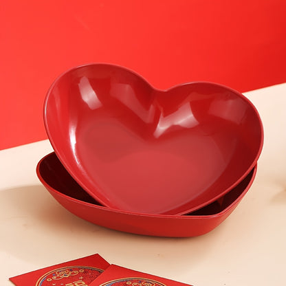 Heart-shaped plastic plates for weddings in sets of 4 or 8. Decorative red serving dishes for snacks, salads, and candy. Versatile party platters for all seasons.