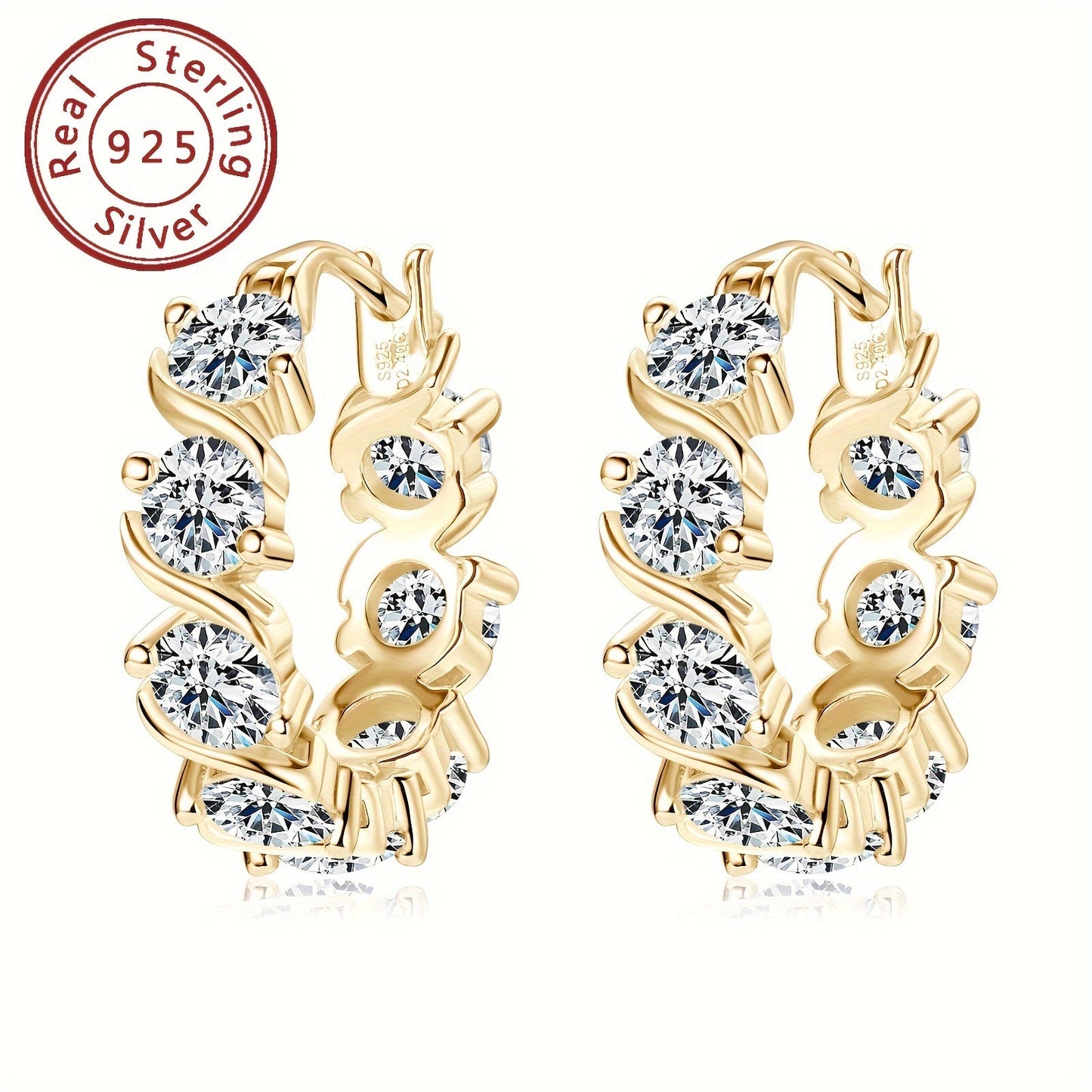 A beautiful pair of Moissanite earrings made with 925 sterling silver. These ladies earrings feature full diamond 4mm round Moissanite stones, with a total of 16 grains on each earring for a total carat weight of 4.8ct. The earrings have a silvery gram