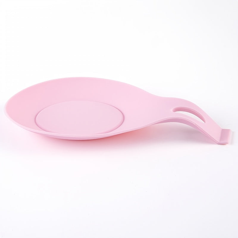 Silicone spoon rest for kitchen utensils - Easy to clean, heat-resistant holder for spoons and seasonings.