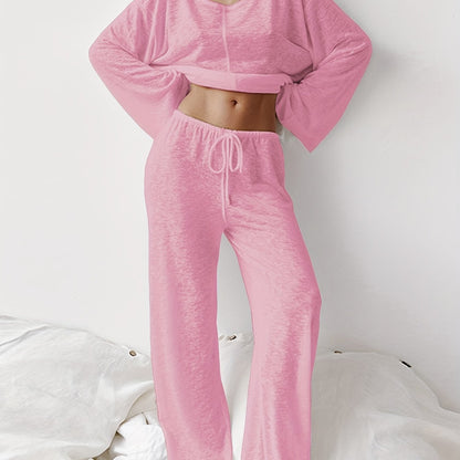 Women's two-piece set of loose and comfortable home clothes made with micro-permeable fabric, featuring round neck and long sleeves.