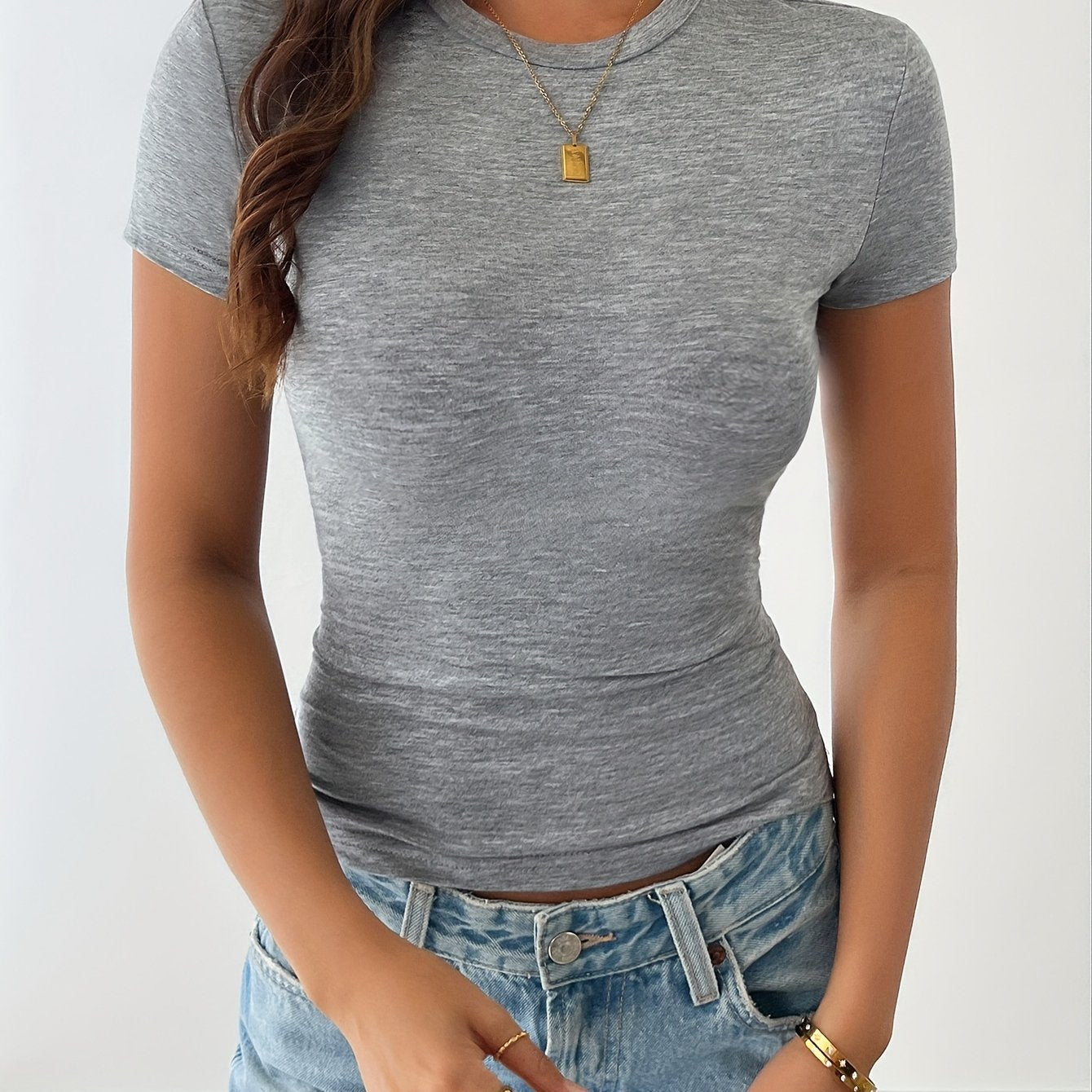 Elegant navy blue slim-fit T-shirt for women, crew neck, short sleeve, stretchy viscose blend, machine washable. Ideal for spring and summer.