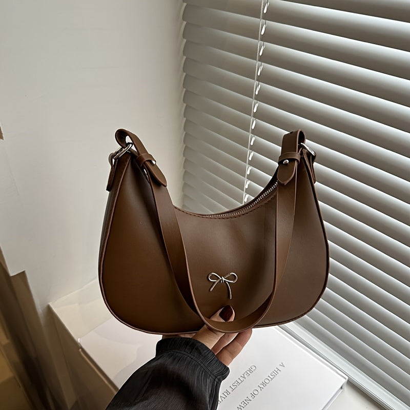 New Korean style shoulder bag with unique design, beautiful and fashionable crescent shape.