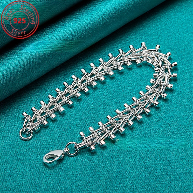 This bracelet is made of high-quality S925 sterling silver featuring a double bead chain design. It is beautifully crafted with exquisite silver detailing, embodying a fashionable retro style. This versatile piece is perfect for everyday wear or special