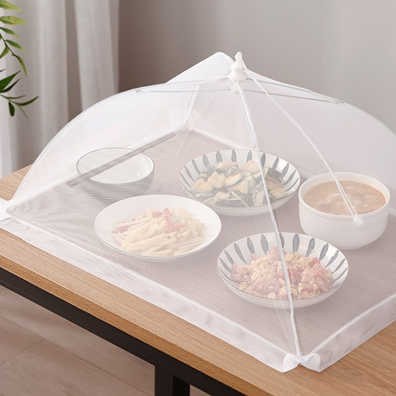 1 white rice cover that doubles as a foldable dining table food cover and household dust cover, suitable for keeping flies away while dining outdoors.