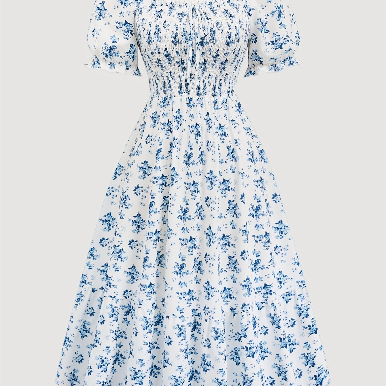 Floral print shirred waist dress with square neck, short sleeves, and tie front for spring and summer. Plus size women's clothing.