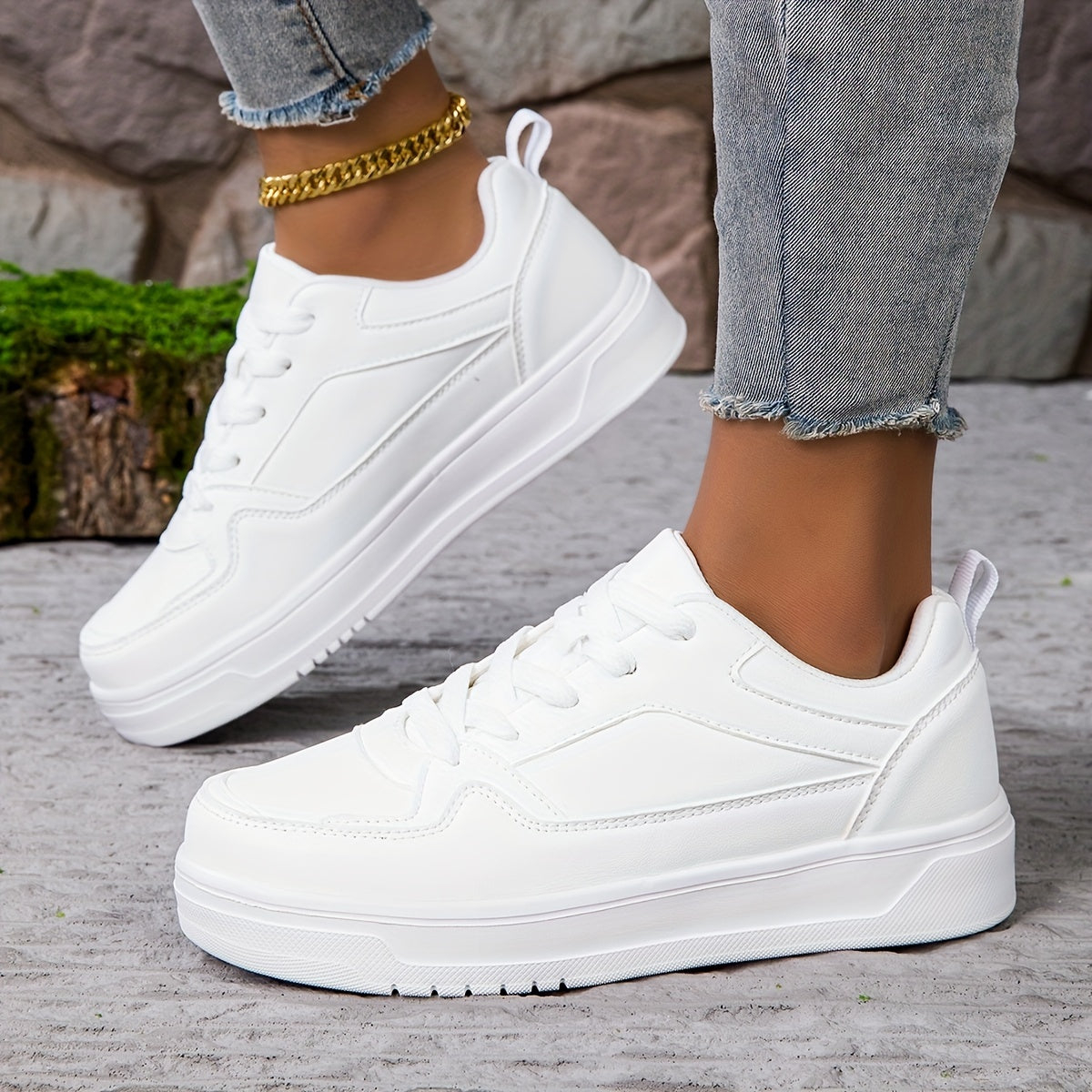 Women's faux leather sneakers with non-slip lace-up design, lightweight EVA sole, and fabric lining.