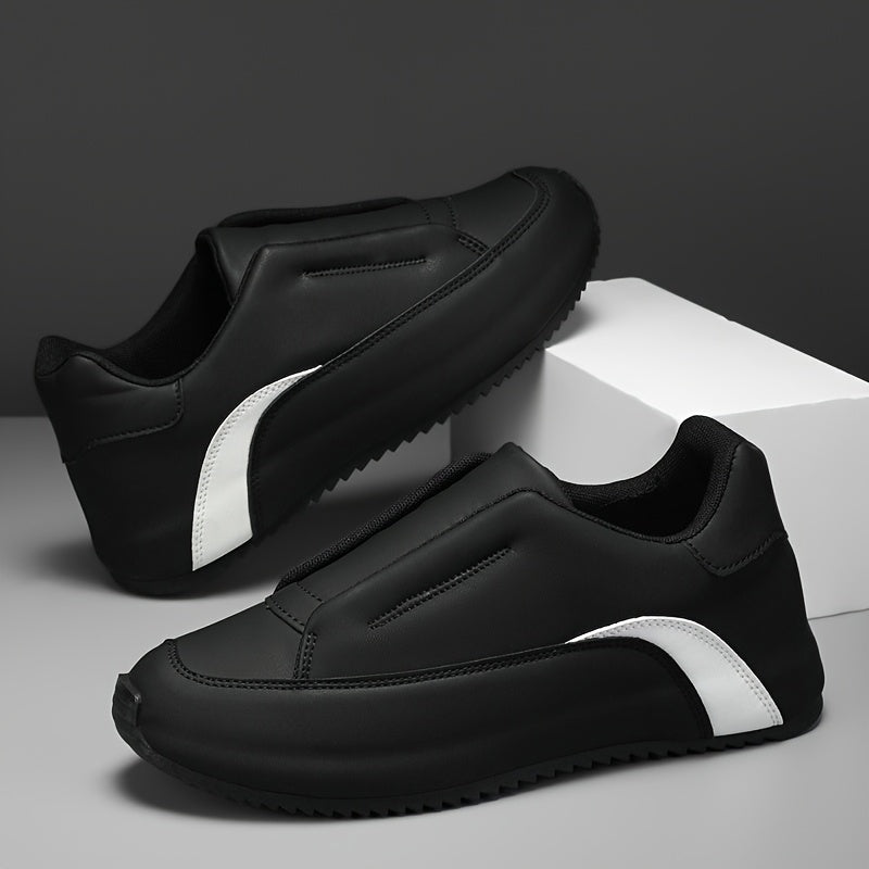 Men's slip-on casual sneakers in black & white with a thick sole, height boosting feature, round toe, and low-top design. Made with PU upper and fabric lining for versatility in all seasons.