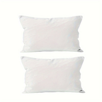 Two contemporary white throw pillow covers measuring at 45.72x45.72 cm made from soft polyester with zipper closure for home décor, machine washable.