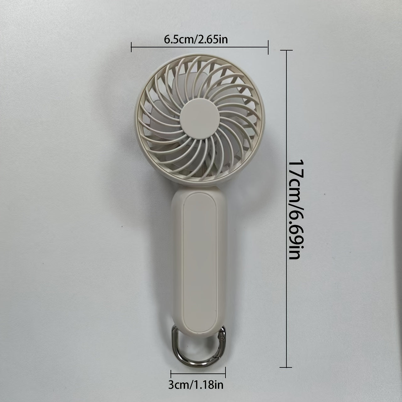 This mini portable fan is perfect for those on the go. It is handheld, personal, USB rechargeable, and battery-operated. You can bring it to the office, bedroom, outdoor travel, and camping. It also comes with a hook loop for easy carrying and