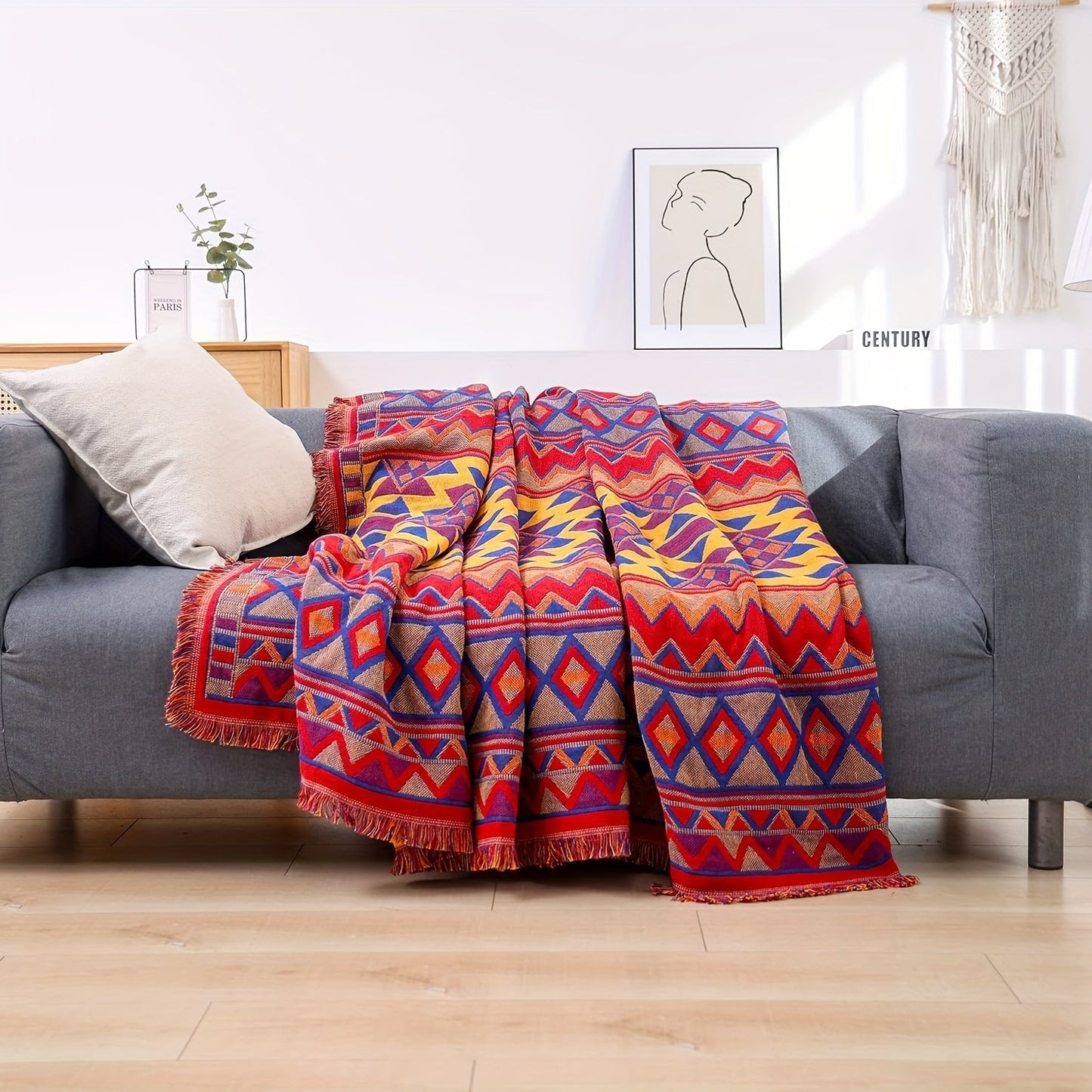 Add a touch of Aztec charm to your home with this Bohemian-inspired reversible throw blanket. Featuring a geometric pattern, chunky knit weave, tassel embellishment, and made from all-season multipurpose synthetic fiber, it is the perfect couch protector