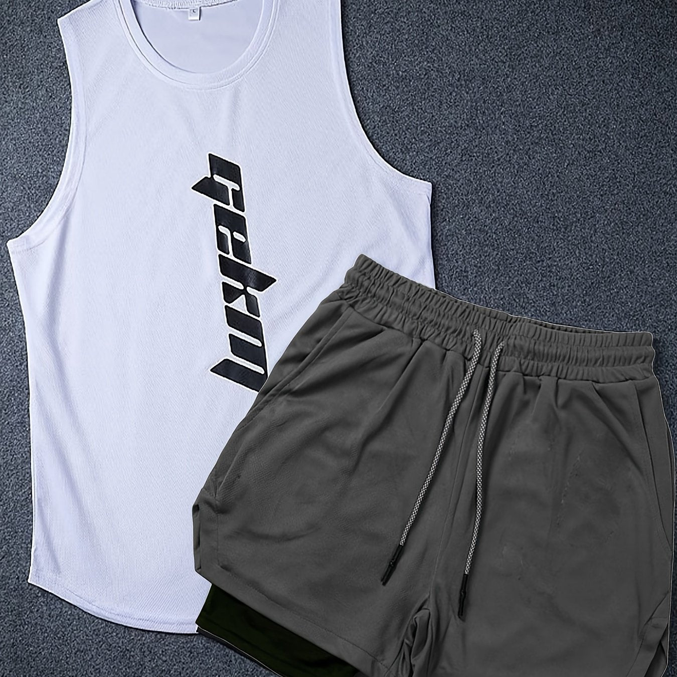 Men's 2-piece fashion set with letter print tank top and drawstring shorts.