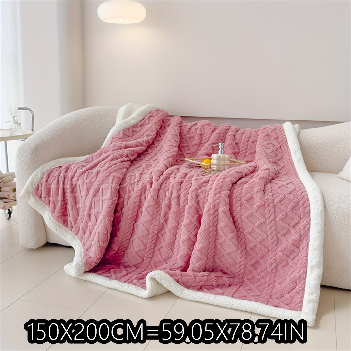 Soft cable-knit fleece blanket in blue, available in 150x200cm or 200x230cm sizes. Featuring a contemporary style, this blanket is machine washable and perfect for use in the bedroom, living room, office, or while camping during the winter. Made with a