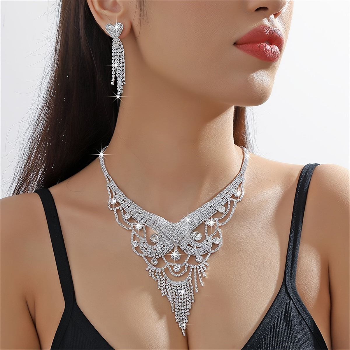 A chic and luxurious set of three tassel necklaces and matching earrings adorned with stunning rhinestones, perfect for adding a touch of glamour to any ladies' party, wedding, or as a high-end jewelry gift filled with love.