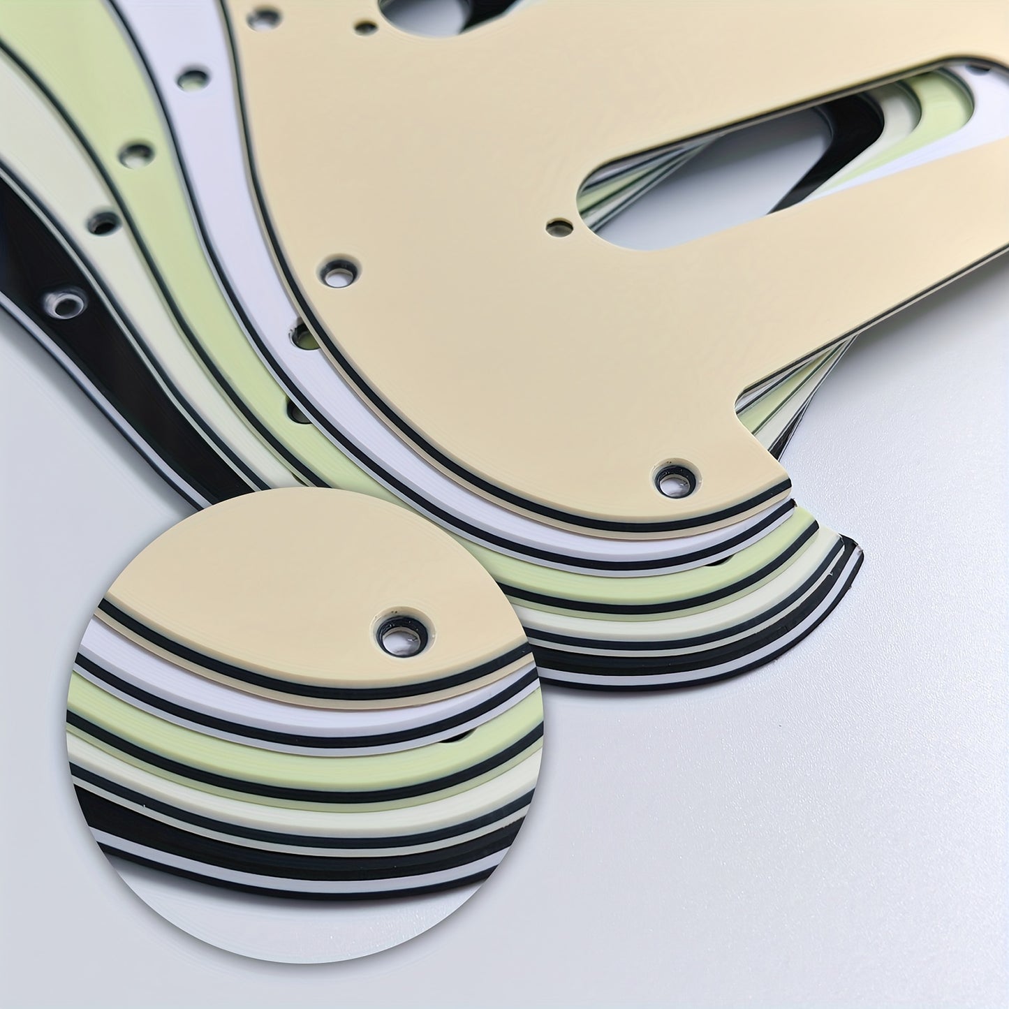 ST electric guitar single pickup guard with 11 holes, installation screws, and aluminum foil shielding. Fits standard FD ST style guitars, available in multiple colors.