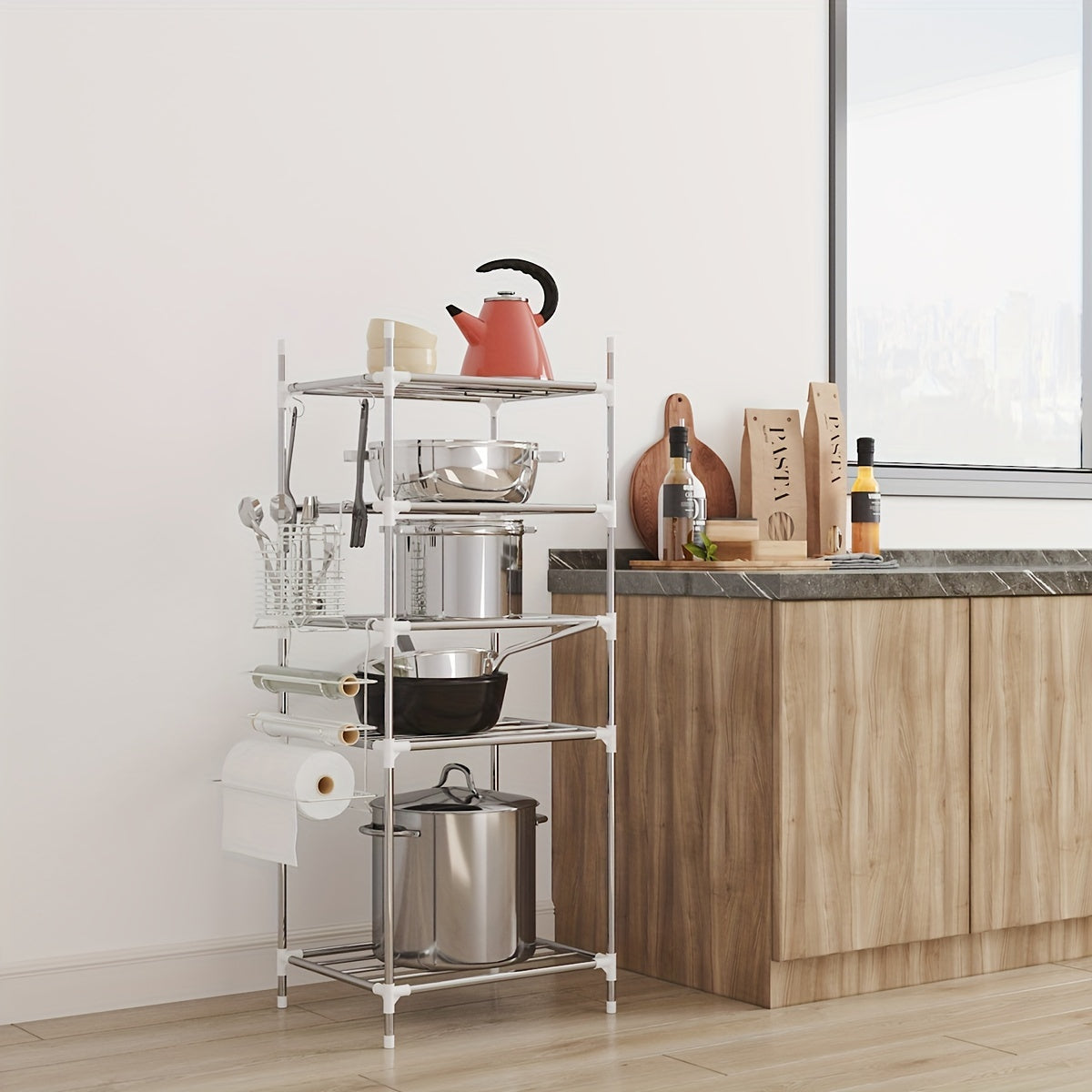 Multi-tier stainless steel storage shelf, ideal for organizing kitchen, bathroom, balcony, and rest room. Perfect for storing cookware, tableware, oven, microwave oven, and basin.