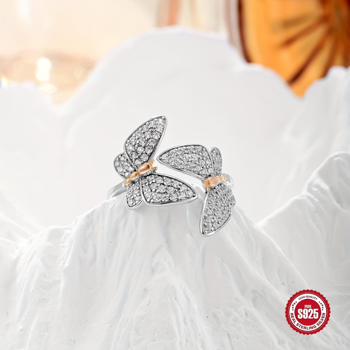 This elegant S925 silver double butterfly ring set with full zirconia is both stylish and delicate. It features an adjustable opening, making it a perfect gift for your girlfriend on Valentine's Day. It is also suitable for wearing with banquet outfits.