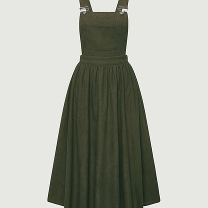 Wide strap dress with patched pocket and elegant backless design, perfect for summer.