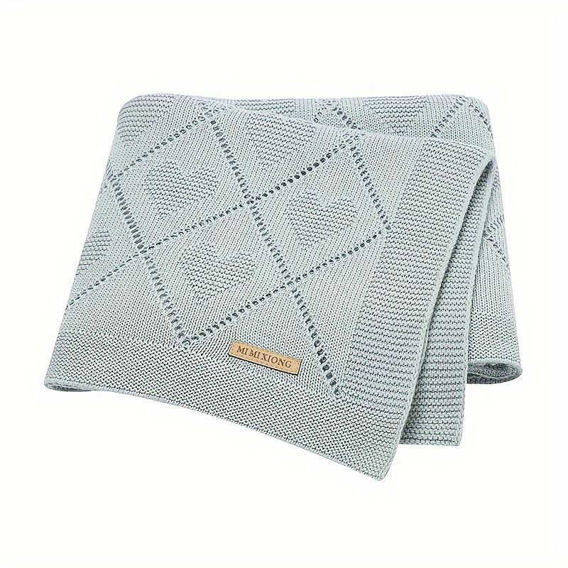 Knitted love hollow blanket designed to cover your air conditioner or sofa, can be wrapped around or hugged for added comfort.