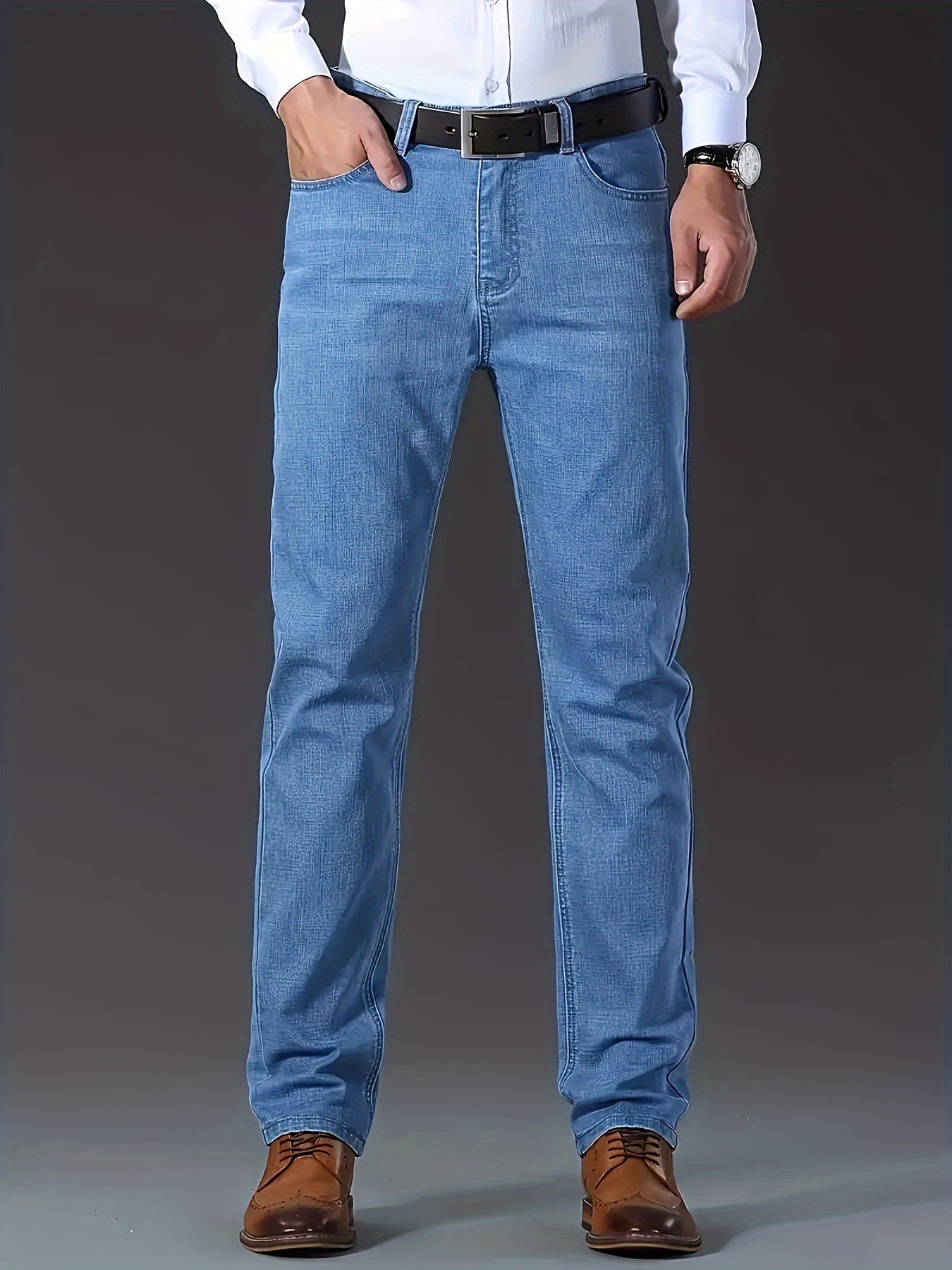 Casual solid denim pants for men with pockets, made from a cotton blend for outdoor activities.