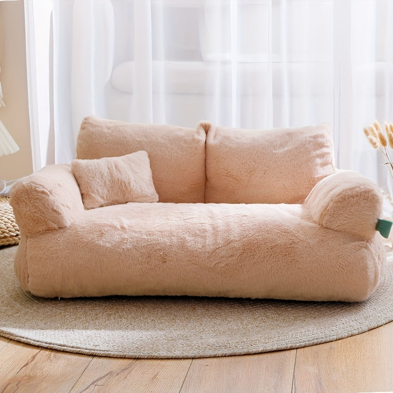 Soft beige plush cat bed with non-slip base, detachable cover, and polyester fill. Ideal for snoozing and relaxing, easy to clean. Perfect for kittens and cats.