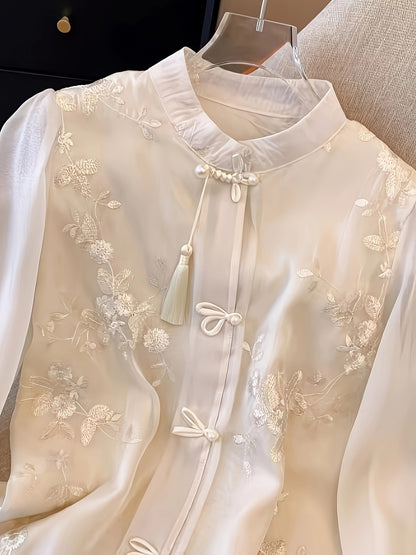 Women's embroidered long sleeve blouse with stand collar, made of 100% polyester woven shirting fabric. Lightweight at 100g/m², ideal for spring/summer fashion in a young style.