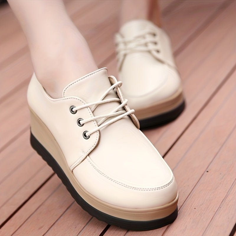 Women's lace-up platform wedge loafers with round toe, heightening design, and versatile style.