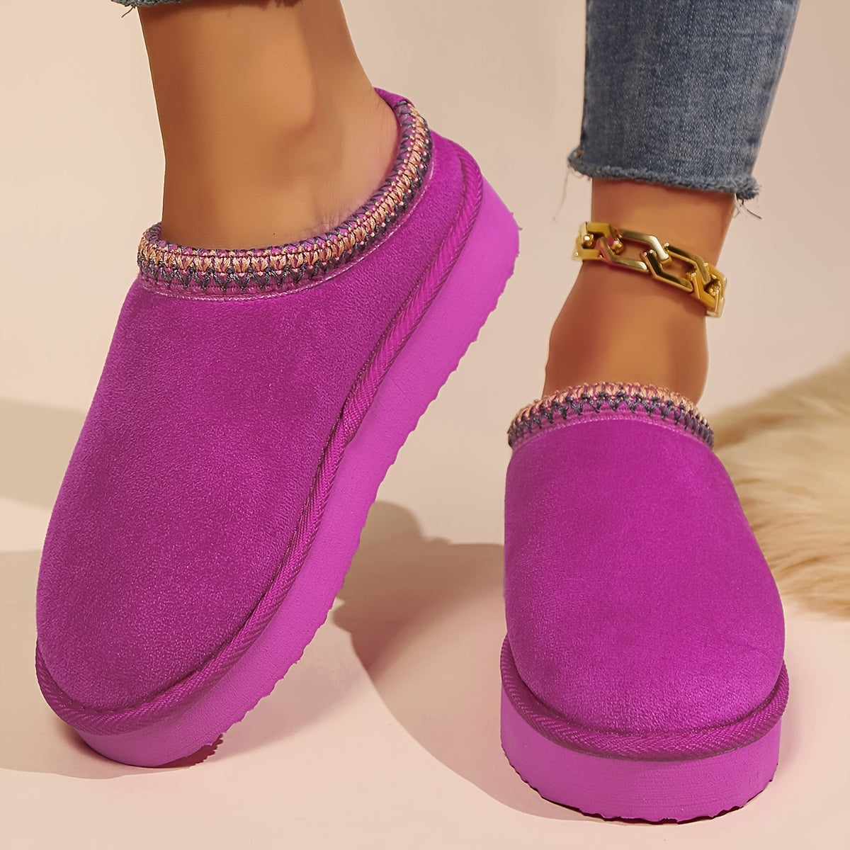 Warm and cozy women's winter slippers with plush lining and anti-slip sole.