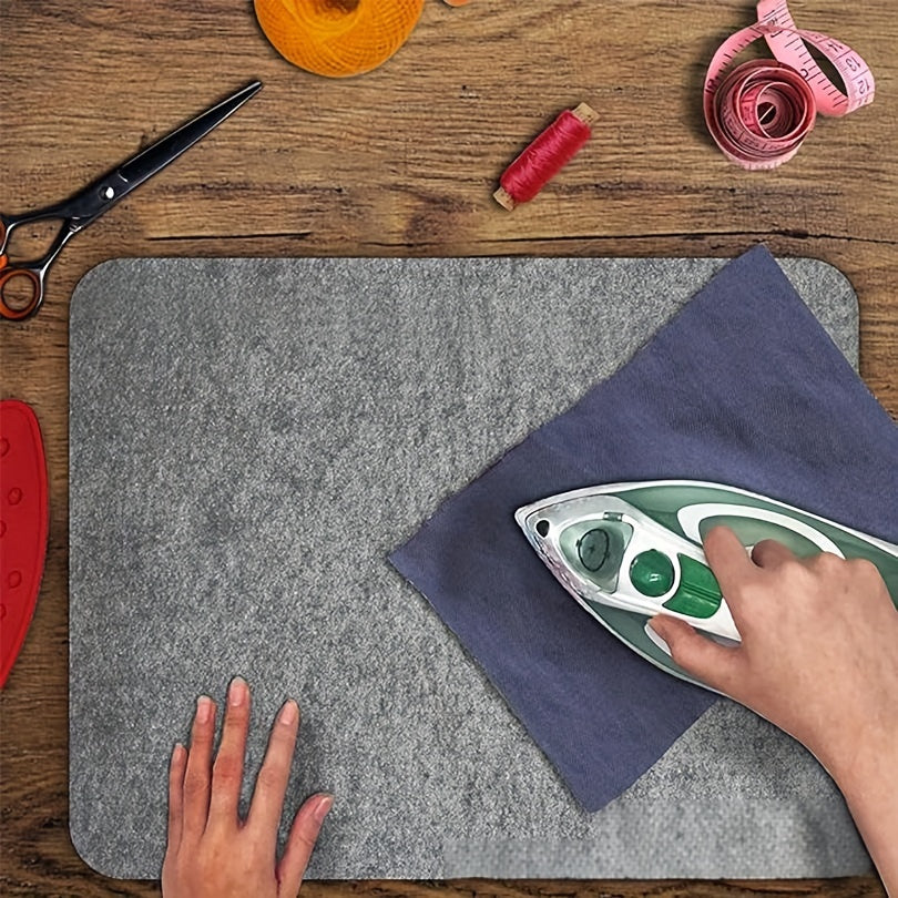 Heat-resistant felt ironing pad perfect for quilting and sewing projects. This durable non-slip laundry steam board makes ironing easy. A must-have for apartment or university dormitories. Also ideal for home office and travel.