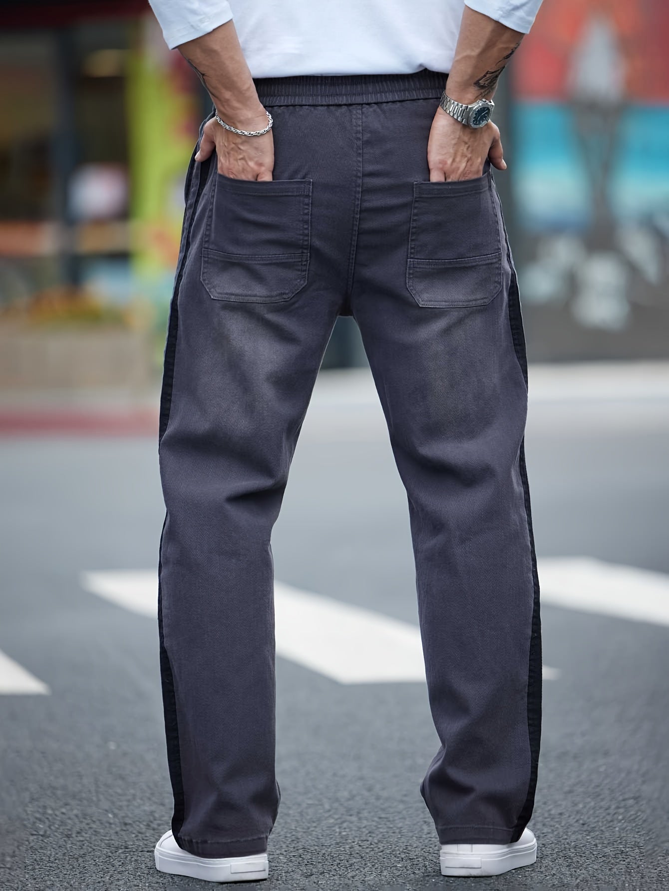 Men's cotton blend label decor straight leg pants with drawstrings for casual sports in spring and fall.