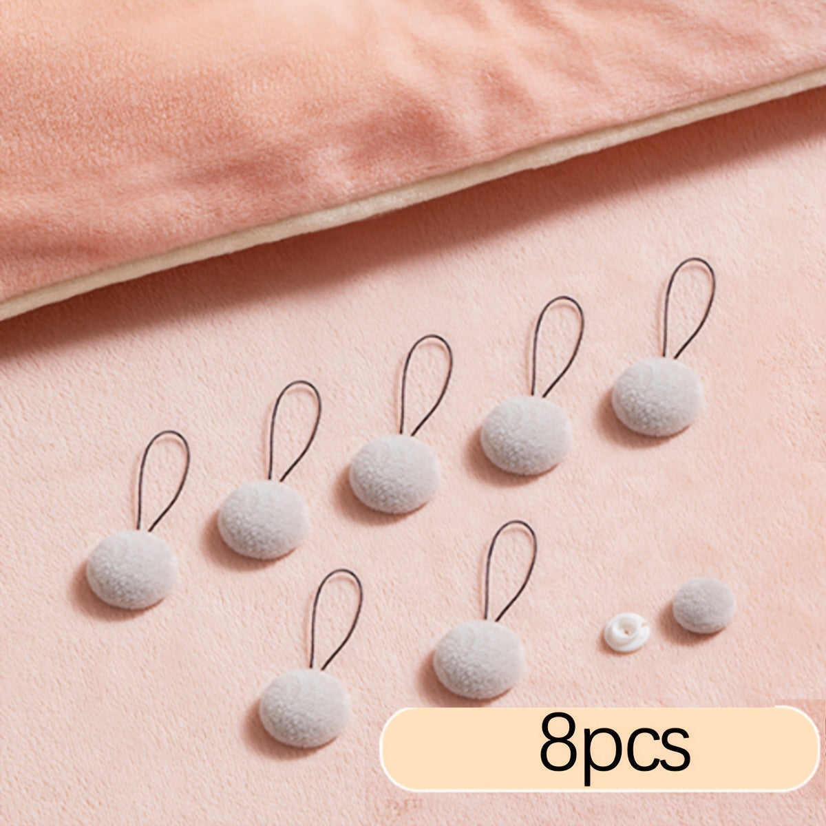 Set of 8 Comforter Clips - No Pins Needed! Keep your quilt in place with these invisible, traceless holders in a variety of colors. Features adjustable gripping clamp for a secure fit. Easily hand washable for long-lasting use.