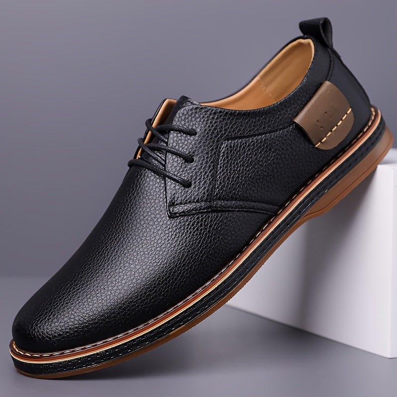 One pair of men's business casual shoes with hand stitched low top lace-up design, flat rubber sole, faux leather upper, inner lining and insole.