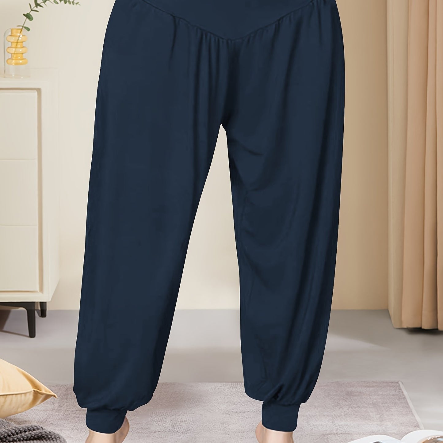 High-waist lantern pants in navy blue, stretchy polyester blend, machine washable, perfect for spring/summer/fall.