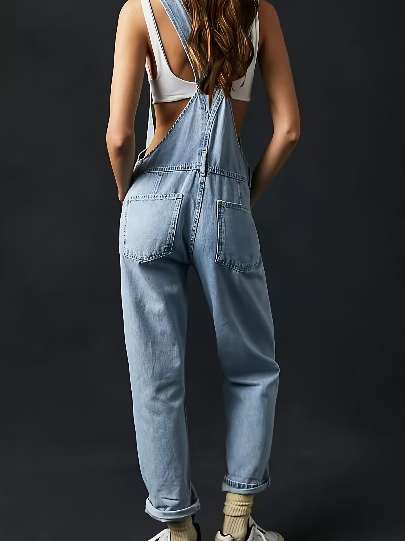 Casual solid color denim overalls for women, made of viscose and polyester blend fabric, strappy back design, no belt included, regular fit.