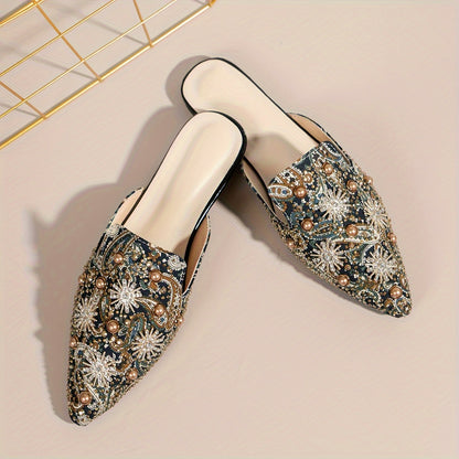 Stylish women's slide sandals with pointed toe, star pattern on flat sole, and easy slip-on design for casual and party wear.