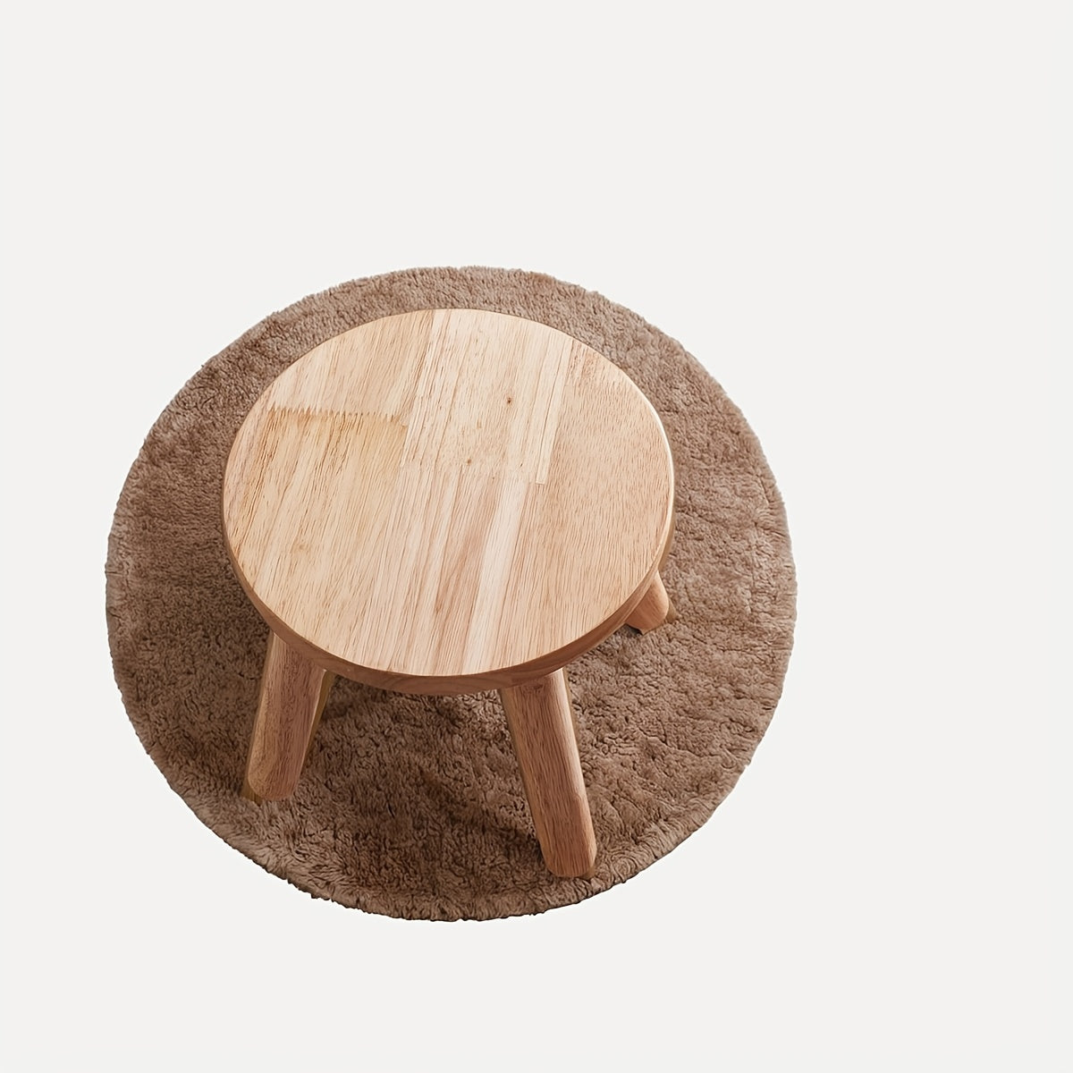 Solid wood round stool ideal for changing shoes at home or office.