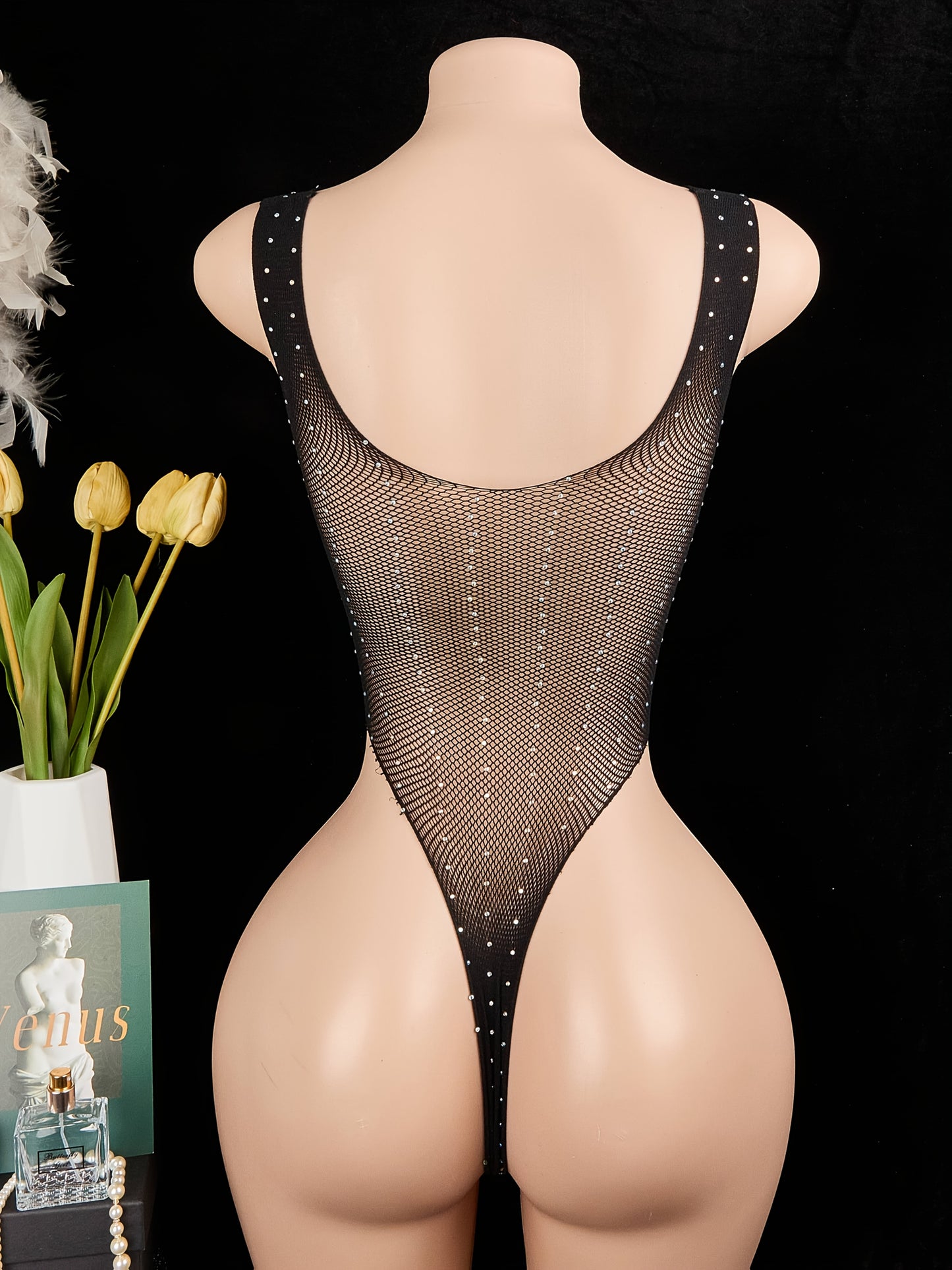 Seductive sheer jumpsuit with lace-up rhinestone detailing for women's backless lingerie.