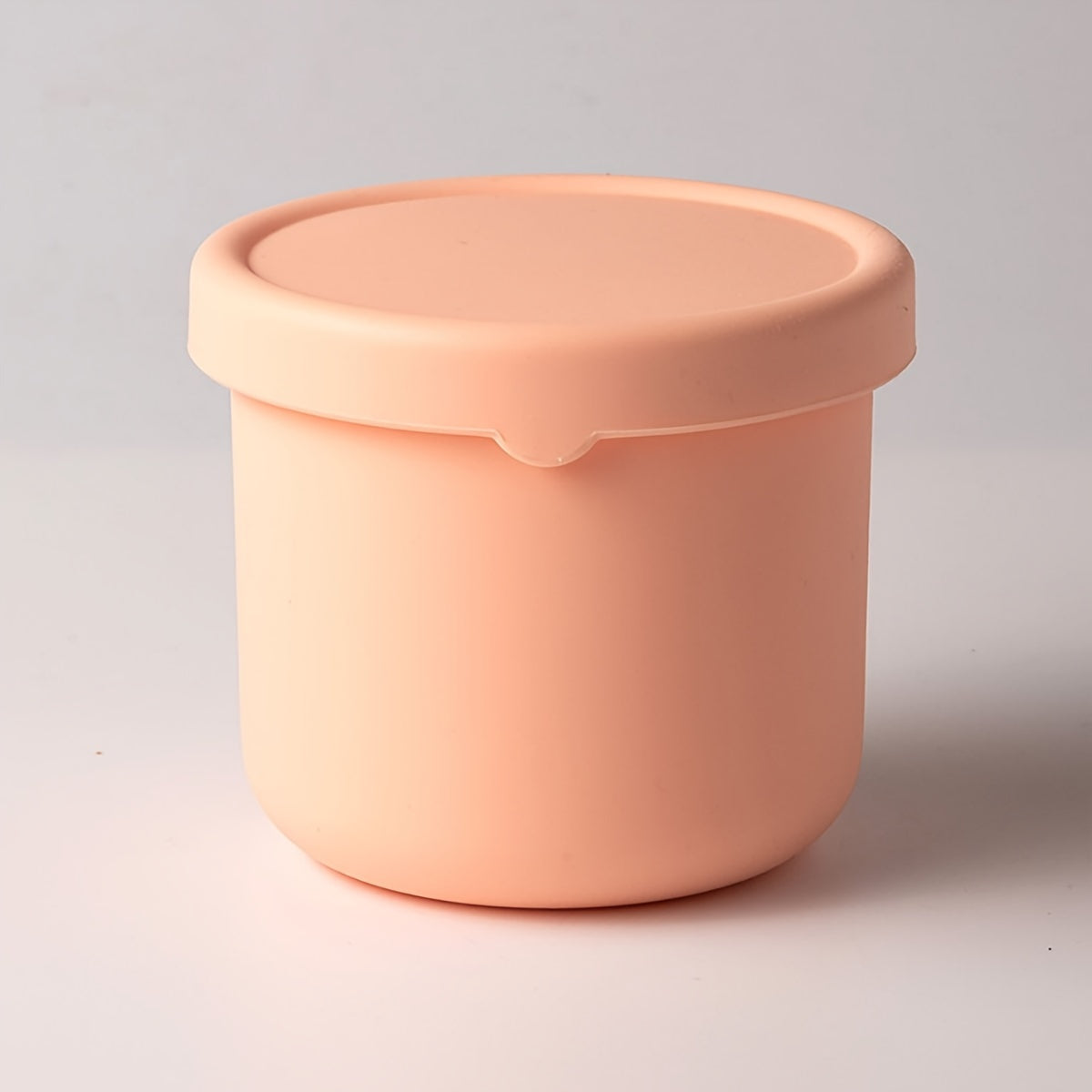 Multi-functional Storage Container made of Silicone - Does not contain BPA, can be used in the Microwave and Freezer. Ideal for storing Fruits, Vegetables, and Lunch items. Circular Kitchen Container with a convenient Flip-Top Cover.