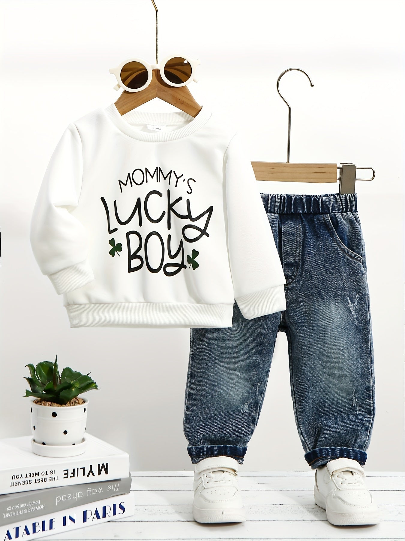 2 piece baby boy outfit set featuring a casual crew neck sweatshirt with "Mommy's Lucky Boy" print and matching denim jeans. Made from cotton blend knit fabric, perfect for the fall/winter