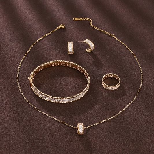 Simple and elegant jewelry set for girls featuring rings, earrings, necklaces, and bracelets with a sleek and luxurious design.