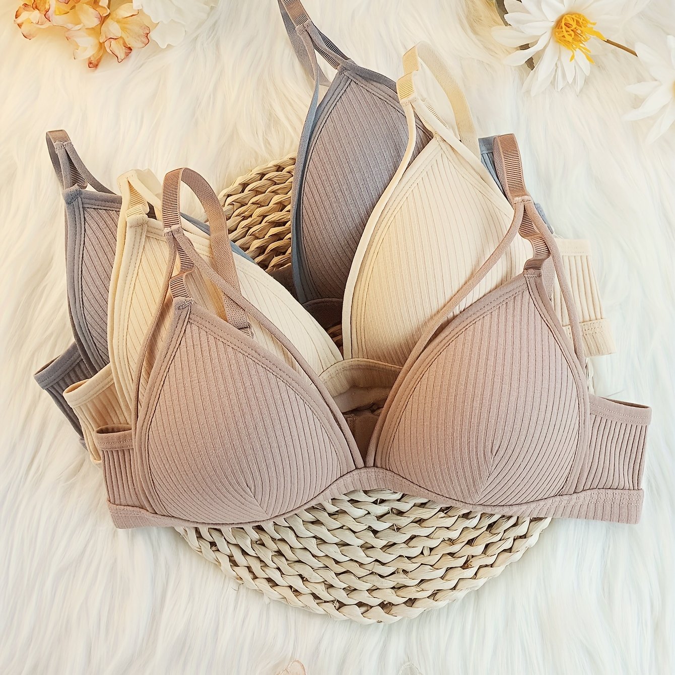 Women's bralettes: 3 elegant solid color pieces with adjustable straps and ribbed texture. Comfortable wireless design, machine washable. Perfect for casual wear.